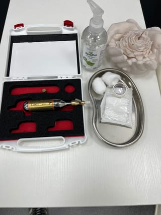 Cryotherapy equipment at The Leech Clinic: the cryo device in its case with an aftercare tray of dressings